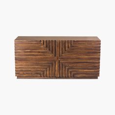 an art deco cabinet made out of wood with wavy lines on the front and sides