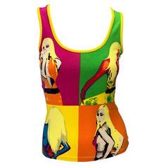 Presenting an iconic vibrant pop art Versace tank top, designed by Donatella Versace. From the Spring/Summer 2004 collection, this top debuted on the season's runway as part of look 31 modeled by Karolina Kurkova. This bright top proudly features pop art renditions of Donatella at the front in her iconic Spring 2000 pink jungle print dress and 'call me 1 900 d-o-n-a-t-e-l-l-a' at the back. Approximate measurements: Size - IT38 / US4 21" shoulder to hem 29" - 38" bust 26" - 30" waist 90% cotton, Top Brillante, Vintage Dior Dress, Karolina Kurkova, Versace Spring, Art Outfit, Dior Dress, Versace Shirt, Donatella Versace, Jungle Print