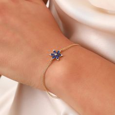 Tiny Sapphire Bracelet, Real 14K Gold Flower Sapphire Bracelet, Dainty initial Sapphire Bracelet, Handmade 14K Gold Anniversary Bracelet, Dainty Custom Bracelet, Anniversary Bracelet, Birthday Gift, Christmas Gift, Solid Gold Bracelet, Minimalist Gold Bracelet, Wedding Bracelet, Valentine's Day Gift "Material: SOLİD GOLD (No Gold Filled Or No Gold Plated)" "KARAT: 14K (585) "Bracelet Length: 14,8 MM "Bracelet Width: 12,9 MM "Available Gold Color: (Yellow Gold, White Gold, Rose Gold) "The certifi Anniversary Bracelet, Gold Flower Bracelet, Blue Sapphire Bracelet, Minimalist Flower, Bracelets With Meaning, Solid Gold Bracelet, Bracelet Christmas, Bracelet Minimalist, Bracelet Wedding