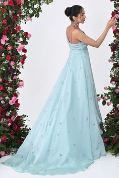 Tiffany blue sleeveless attached cancan padded gown with tonal rose bloom sequin embroidery and plunging V neckline. - Aza Fashions Sleeveless Gown With Floral Applique For Prom, Sleeveless Organza Dress For Reception, Sleeveless Gown With Floral Embroidery For Reception, Sleeveless Prom Gown With Floral Applique, Sleeveless Floral Applique Prom Gown, Sleeveless Gown With Floral Applique, Sleeveless Wedding Gown With Floral Applique, Sleeveless Gown With Fitted Bodice For Reception, Sleeveless Floral Embroidered Gown For Prom Season