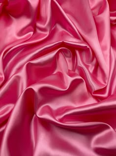 Pink satin fabric Add a delicate touch to your apparel, curtains, bedding, costumes, and crafts with this pink satin fabric. Its light fabric weight and solid/plain pattern make it a versatile choice for any project. Measuring 58 inches wide, this fabric is perfect for draperies, cushions, and everyday clothing. The exact colour of the fabric is baby pink, making it an ideal choice for weddings, decorations and bridal wear. Use this fabric for draping and create a soft, romantic atmosphere. This Satin Fabric Texture, Wear It Pink, Pink Satin Fabric, Baby Pink Colour, Everyday Clothing, Pink Vibes, Romantic Atmosphere, Satin Color, Polyester Dress