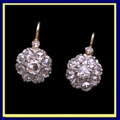 Antique Victorian era diamond earrings. 18k yellow gold, silver and diamonds. Made in France, 19th century - circa 1860 - 1890. Independent appraisal and certificate. Measurements: Weight is 5.10 grams. 2.54ct rose cut diamonds. diamonds, excluding gold wires approximately 5/8 inch (16mm) top to bottom. Description : Classic flower-form earrings with beautiful rose cut diamonds forming the centers and petals of the flowers. Small rose cut diamond surmounts from 18k gold wires. As was the custom of the period, diamonds were set in silver over gold to show them off to better effect in candle or gas light. Backs and mounts entirely gold. Hinged clasps for wires. Easy to insert and very secure. Beautiful gems and beautifully made, these earrings are as versatile and wearable today as they were Small Rose, Gold Wire, Beautifully Made, Beautiful Rose, Rose Cut Diamond, Antique Victorian, Victorian Era, Beautiful Roses, Rose Cut