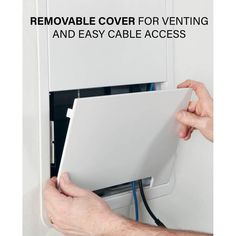 a man is removing the cover for venting and easy cable access