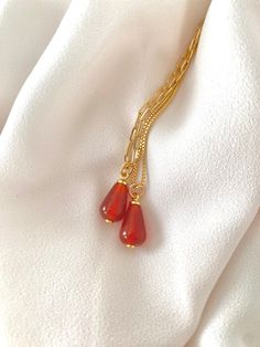 Carnelian Necklace Red Carnelian Gemstone Pendant Gold Filled Figaro Chain Teardrop Shaped Carnelian Orange Crystal Necklace Christmas Gift Luxury Elegant Amber Crystal Necklaces, Carnelian Gemstone Drop Jewelry, Handmade Gold Carnelian Crystal Necklace, Adjustable Gold Carnelian Necklace, Gold Carnelian Teardrop Jewelry, Gold Carnelian Crystal Necklace Gift, Spiritual Teardrop Carnelian Jewelry, Orange Chalcedony Jewelry For Gifts, Gold Carnelian Pendant Necklace