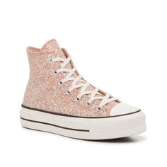 Converse-Chuck Taylor All Star Glitter Platform Sneaker - Women's Add a fun flair to your casual style by lacing up the Chuck Taylor All Star Glitter platform sneakers from Converse. This pair features classic details that the original was known for. Complete with a cap toe, vulcanized midsole, and high-top design. Finished off with a thick sole to lift your look and confetti-like accent decorated throughout the upper. Baskets Converse, Chuck Taylor All Star Lift, Converse Sneakers, Platform Sneaker, Converse Chuck Taylor All Star, Converse High, Athletic Sneakers, Platform Sneakers, Converse All Star