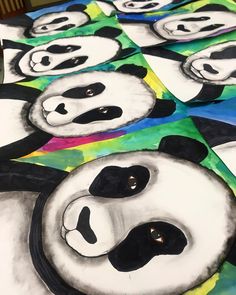 the panda bears are all painted in different colors and sizes, including black on white