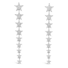 Make a statement with these twinkling diamond star dangle earrings, composed of pave set diamonds embedded into 14K gold of your choice. -14K gold weighing 3.93 grams -228 round pave set diamonds totaling 0.97 carats Available in rose, yellow, and white gold. Item no. E10997 Custom Bangle, Star Dangle Earrings, Diamond Engagement Rings Cushion, Cushion Halo Engagement Ring, Diamond Bar Necklace, Round Halo Engagement Rings, Oval Diamond Engagement, Engagement Rings Cushion, Oval Diamond Engagement Ring