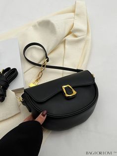 BagForLove - Sophisticated Metal Flap Saddle Bag Product Description Color Black Type Saddle Bag Bag Size Small Strap Type Chain Pattern Type Plain Style Fashionable Material PU Leather Size Chart INCH CM Strap Length Bag Length Bag Width Bag Height Handle Height 47.2 inch 8.7 inch 3.1 inch 6.3 inch 10.2 inch Strap Length Bag Length Bag Width Bag Height Handle Height 120 cm 22 cm 8 cm 16 cm 26 cm Details Pictures Similar Products h2 { text-align: center; } /* æ¢è¡ */ li{ white-space: normal; w Black Satchel Shoulder Bag With Single Handle, Black Top Handle Shoulder Bag With Single Handle, Black Tote Bag With Single Handle, Black Tote Shoulder Bag With Single Handle, Black Single Handle Tote Shoulder Bag, Black Travel Bag With Single Handle, Black Single Handle Travel Bag, Black Handheld Bag With Single Handle, Black Crossbody Saddle Bag For Shopping