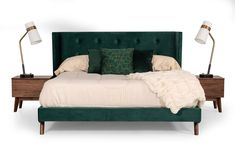 a green bed with two nightstands on each side