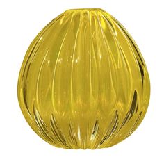 a yellow glass vase sitting on top of a table