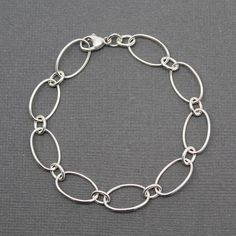 Hey, I found this really awesome Etsy listing at https://www.etsy.com/listing/483368672/oval-round-chain-bracelet-sterling Modern Sterling Silver Bracelet With Oval Link Cable Chain, Silver Charm Bracelet With Oval Link Chain, Silver Charm Bracelet With Oval Link, Silver Oval Link Charm Bracelet, Silver Oval Link Chain Bracelet With Cable Detail, Silver Cable Chain Bracelet With Oval Links, Sterling Silver Oval Link Chain Bracelet, Silver Oval Link Chain Bracelet, Sterling Silver Oval Link Charm Bracelet