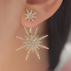 Intricate and sparkling star stud earrings are fashionably trendy and dazzling.  These would be absolutely gorgeous for a wedding, bridal party or any occasion.  Make your selection in gold and silver.  Great for those who are celestial fans! Earring Details: * COLOR:  Gold or Silver * MATERIAL:  Zinc Alloy, Cubic Zirconia, and metal ear push back posts for pierced ears * WEIGHT:  Lightweight - 6 grams (pair) * SIZE:  1.57 inches Length /  1 inch Width * INCLUDES:  Clear rubber earring backs wit Gold Star Earrings, Wedding Gifts For Friends, Silver Star Earrings, Gold Starburst, Cheap Earrings, Starburst Earrings, Sparkling Stars, Star Earrings Stud, Ear Jacket