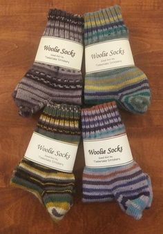 Hand knit wool crew socks fit women's shoe size 7-9 and men's shoe size 7-8.  Available in either a jacquard or stripe pattern.  These socks are warm, cozy, and have a non binding cuff.  Your feet will be toasty no matter what the winter weather brings your way!  Patterns may vary slightly from those pictured due to the unique nature of the yarn.  Made of 75% washable wool and 25% nylon yarn.   Machine wash in cold water.  Machine dry low heat. Knit in a smoke free and pet friendly home. ** The beautiful sock blockers displayed in the photos can be found at the Etsy shop aneedlerunsthroughit #aneedlerunsthroughit. Hand Knitted Yarn Socks For Winter, Striped Socks For Winter Stocking Stuffer, Striped Socks For Stocking Stuffers In Winter, Wool Socks Pattern, Handmade Yarn Socks For Winter, Comfortable Hand Knitted Winter Socks, Hand Knit Striped Socks, Wool Hiking Socks For Women, Sock Blockers