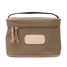 PERFECT Gift for Valentines Day! This makeup case from Jon Hart is perfect for any lady! Features include an interior pocket for small, easily lost items (looking at you, tweezers); a natural leather handle for easy transport; and a vinyl-coated canvas that makes it durable for daily use. Beige Travel Cosmetic Bag With Removable Pouch, Portable Leather Cosmetic Bag Rectangular Case, Portable Leather Cosmetic Rectangular Case, Beige Rectangular Cosmetic Bag, Brown Cosmetic Bag With Removable Pouch, Beige Rectangular Cosmetic Bag For Everyday Use, Brown Rectangular Cosmetic Bag With Removable Pouch, Modern Beige Cosmetic Bag, Modern Beige Cosmetic Bag For Everyday Use