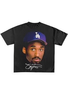 a black t - shirt with an image of a man wearing a dodgers hat