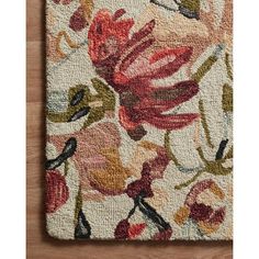 an area rug with flowers on it