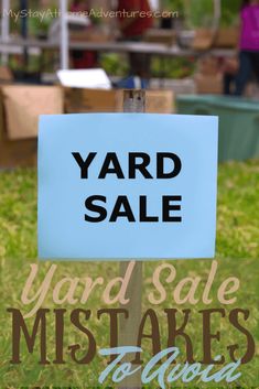 a yard sale sign with the words yard sale written on it