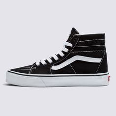 A Slender Take on Our Iconic High-Top ShoeOur legendary high-top shoe gets slimmed down with a deconstructed upper in the Sk8-Hi Tapered. With a more slender fit than the original Sk8-Hi, this laid-back take on an icon offers a streamlined look with plenty of style. Legendary high-top, Sidestripe™ shoe Slender silhouette Deconstructed canvas uppers Lace-up closure Metal eyelets Signature rubber waffle outsoles | Vans Sk8-Hi Tapered Canvas Shoes (Black/True White) - 4.5 Boys/6.0 Women Vans High Top, Black White Shoes, Freestyle Skiing, Vans Toddler, Vans Store, High Top Shoe, Vans Kids, Extreme Sport, White Shoe