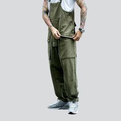 Introducing our 2023 Spring-Summer Collection safari-style baggy bib overalls a urban trend that's sure to turn heads!Why You'll Fall In LoveThis unique silhouette is tailored for the couture-forward who prefer making a statement. With its baggy fit and suspenders closure. you can enjoy a fashion take on the timeless safari-style overalls. Its vibrant colors and sanded finish promise a timeless. laid-back look that'll make you stand out from the crowd.Unmissable Highlights: Baggy Fit: Unparallel Casual Summer Overalls With Bib Front, Summer Utility Cotton Overalls, Utility Cotton Overalls With Pockets, Baggy Overalls Pants For Spring, Baggy Overalls For Spring, Relaxed Fit Cotton Overalls, Spring Baggy Overalls Pants, Spring Relaxed Fit Overalls, Summer Utility Cotton Jumpsuits And Rompers