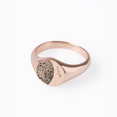 While we all may share certain characteristics or traits, there are a few things that are always unique to any given individual. The most iconic trait of which is the fingerprint. An understated, interesting, yet beautiful identifier of ourselves. With fingerprint jewelry, you can now make a special fingerprint a fashion statement through a personalized ring. These fingerprint rings come in three different colors, text can also be engraved inside the ring, adding a little more intimacy and perso Modern Personalized Rose Gold Rings, Etched Promise Ring, Minimalist Etched Round Ring, Rose Gold Open Dome Ring Gift, Symbolic Rose Gold Promise Rings, Rose Gold Stamped Rings As A Gift, Rose Gold Stamped Rings For Gifts, Rose Gold Stamped Rings Ideal For Gifts, Minimalist Etched Rings For Promise