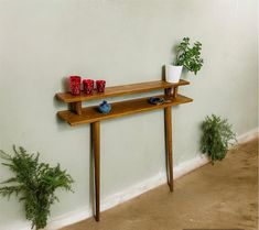 Placed above the radiator in your living room, hallway; The stunning slim reclaimed wood console table is perfect for any room in your home. Dimensions: ---------------- Leg Height: 29.5" (75cm) Legs Width: 7.9" İnc ( 20 cm ) Length: 15.7" ( 40 cm ) - 78.7" ( 200 cm ) Thickness: 18mm Pitch: 4" ( 10 cm ) Please contact us for the special size and colors you want. Would you like a different size? We can do this. We can make all our products in any size you want. The product is very easy to install. It offers different usage areas thanks to its segmented structure. You can put whatever you want in it. This slim wooden console is perfect anywhere in your home, in your living room, hallway, above the radiator or even as a backrest. It will look perfect at the entrance of your home, behind your Console Tables Slim, Narrow Entry Table Brass, Narrow Entryway Tables Wood, Narrow Entry Table Bohemian, Minmalist Narrow Console Table, Narrow Tall Console Table Entryway, Hallway Narrow Shelf, Narrow Hallway Table Front, Stairway Slim Table Entryway