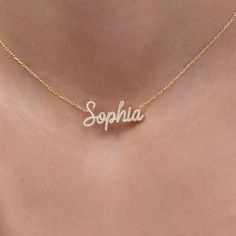 This 14k personalized diamond name necklace is the perfect gift for the bridal party, someone special, or yourself. How to order 1- Pick the fonts you like and send us a message 2- We will send you a picture of your name with the fonts you chose 3- If you like it any of them, place your order. 4- We send a final 3d mock up for approval. 5- Once approved we go ahead and finish your necklace. __________________________________________ M A T E R I A L & L E N G T H Available in 14k Yellow Gold, 14k Name On Necklace, Affordable Mother's Day Name Necklace Gift For Her, Cheap Customizable Pink Name Necklace, Luxury Diamond Nameplate Necklace Gift, Classic Personalized Diamond Necklace For Anniversary, Personalized Classic Diamond Necklace For Anniversary, Personalized Diamond Nameplate Necklace, Diamond Initials Name Necklace For Anniversary, Personalized Diamond Name Necklace