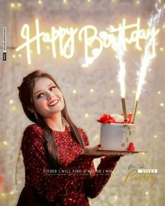 a girl holding a birthday cake with sparklers on it and the words happy birthday written above her