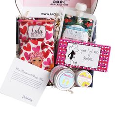 an open gift box filled with personal care items