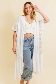 Introducing our Boho Tribal Embroidered Longline Kimono – a statement piece that effortlessly blends style and cultural flair! This longline kimono features intricate tribal embroidery, adding a bohemian touch to your wardrobe. With a relaxed fit and flowing silhouette, it's perfect for layering over any outfit. Whether you're hitting the festival scene or looking for a boho-chic layer for everyday wear, this kimono has you covered. Elevate your style with the Boho Tribal Embroidered Longline Kimono – where fashion meets cultural inspiration in one stunning piece! #lovemyleto 100% Viscose Imported