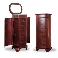 a wooden jewelry cabinet with an oval mirror on the door and drawers in front of it