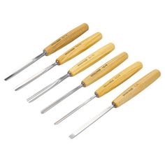 six pieces of wood carving tools with wooden handles