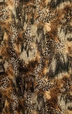 an animal print fabric with lots of different colors and patterns on the pattern is shown