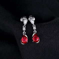 1.9ct Pear Created Red Ruby 925 Sterling Silver Drop Earrings Gemstone Jewelry Specifications - Style: Dangle Drop Stud Earrings - Gem Color: Red - Gem Cut: Water Drop - Material: Solid 925 Sterling Silver - Metal Stamp: S925 - Item Weight: 2.1g - Main Stone: Ruby High-Quality Materials Crafted from solid S925 sterling silver, these small water drop earrings boast strength and shine. They are tarnish-resistant and hypoallergenic, ensuring comfort without irritation. Fit for Any Occasion Enhance Red Ruby Earrings, New Fashion Earrings, Healing Crystal Jewelry, Sterling Silver Drop Earrings, Tiny Stud Earrings, Ruby Earrings, Ruby Stone, Sterling Silver Dangle Earrings, 925 Silver Earrings