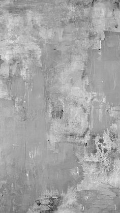 black and white photograph of an old wall with paint peeling off it's sides