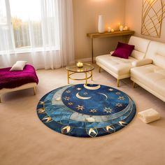 a living room filled with furniture and a large rug on the floor in front of a window