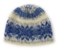 a blue and white knitted hat on a white background