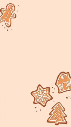 gingerbread cookies are flying in the air with snowflakes and trees around them