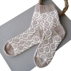 Ready to ship.These are beige cozy women's handknitted socks with a jacquard pattern. They are perfect for home and for sleeping. These socks are suitable for slender legs or legs of medium fullness. These socks fit on a highrise foot.Composition: 75% wool, 25% polyamide.Size US 67 (EU 3738)Create in a house where smoking is prohibited.Care: Machine wash at water temperature 3040 °C.There may be some color discrepancies which is due to the different monitor setting.Thank you for visit my store! Beige Socks, Men In Heels, Rainbow Dog, Hand Knit Socks, Sock Knitting Patterns, Mens Stripes, Jacquard Pattern, Wool Socks, Winter Gift