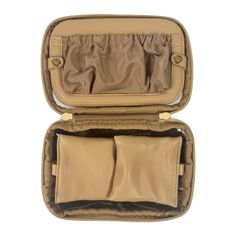 the inside of a tan leather case with two compartments