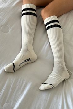 Why We Made This? Introducing the Knee High Boyfriend Socks, a modern take on classic retro tube socks inspired by the beloved original Boyfriend Socks. These socks reach just below the knee with their signature double sporty stripe. They effortlessly combine function and fashion, offering endless styling possibilities and promised comfort. Stripe Color: White Made in South Korea Boyfriend Socks, Clogs Heels, White Tights, Tube Socks, New Instagram, Sneakers For Sale, Dress With Boots, Sock Shoes, Black Stripes