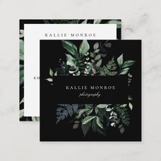 a black and white business card with greenery