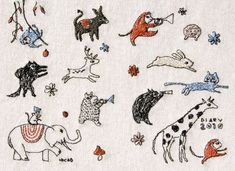 an embroidery pattern with animals and birds on it