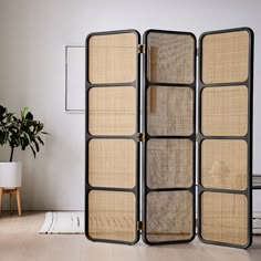 the room divider is made out of wood and metal