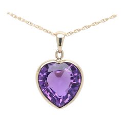 Large Purple Heart Pendant Heart shape 13.60 carat Deep Purple Amethyst Nice Brilliant Rich purple tone Color. Natural Amethyst Gemstone Bezel set in 14k yellow gold total weight 3.6 grams (without the chain) Size: approx 15 mm in diameter Included basic 14k chain 16' inch (chain style design may vary based on availability) +Gift Box Purple Tone, Amethyst Heart, Rich Purple, Heart Gemstone, Heart Shape Pendant, Purple Heart, Amethyst Pendant, In Between, Amethyst Gemstone