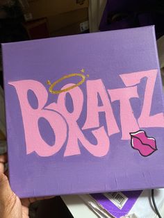 a purple box with the word braz painted on it