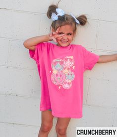 Our retro smiley face graphic tee features a leopard and flower happy face collage design. This Comfort Colors tee pairs perfectly with the adult, kids, and toddler versions (linked below). ✩ ✩ 𝗧𝗼𝗱𝗱𝗹𝗲𝗿 𝗕𝗲𝗹𝗹𝗮 𝗖𝗮𝗻𝘃𝗮𝘀 𝗧𝗲𝗲: https://starrieapparel.etsy.com/listing/1703013782 ✩ 𝗞𝗶𝗱𝘀 𝗕𝗲𝗹𝗹𝗮 𝗖𝗮𝗻𝘃𝗮𝘀 𝗧𝗲𝗲: https://starrieapparel.etsy.com/listing/1717190205 ✩ 𝗞𝗶𝗱𝘀 𝗖𝗼𝗺𝗳𝗼𝗿𝘁 𝗖𝗼𝗹𝗼𝗿𝘀 𝗧𝗲𝗲: https://starrieapparel.etsy.com/listing/1728071839 ✩ 𝗔𝗱𝘂𝗹𝘁 𝗕𝗲𝗹𝗹𝗮 𝗖𝗮𝗻𝘃𝗮𝘀 𝗧𝗲𝗲: https://starrieapparel.etsy.com/listing/1717164829 Kids Smiley Face Shirt, Youth Flower Smile Face Retro Graphic Tee, Girls Leopard Happy Face Tshirt, Cute Girly Summer Comfort Colors T-shirt ✩ Our shop uses direct-to-garment printing to make our products. The design ink Cute Smiley Face Tops For Spring, Playful Pink Tops With Screen Print, Cute Smiley Face Tops For Summer, Cute Smiley Face Top For Spring, Cute Cotton Tops With Smiley Face, Cute Spring Tops With Smiley Face, Playful Pink Top With Screen Print, Fun Short Sleeve Tops With Smiley Face, Cute Smiley Face Summer Tops