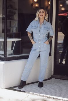 Free People Marci Denim Jumpsuit - Clear Skies-FREE PEOPLE-Jayden P Boutique Utility Denim Jumpsuit With Short Sleeve And Relaxed Fit, Utility Style Denim Jumpsuit With Relaxed Fit, Spring Light Wash Denim Jumpsuit For Work, Light Wash Denim Overalls With Button Closure, Spring Washed Denim Jumpsuit For Work, Spring Workwear Washed Denim Jumpsuit, Spring Denim Jumpsuit For Workwear, Denim Jumpsuit For Workwear In Spring, Light Wash Fitted Denim Jumpsuit Button-up