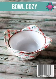 a bowl sitting on top of a wooden table next to a barcode sticker