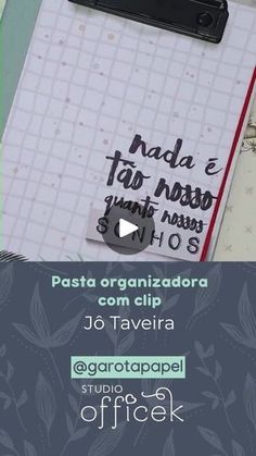 a clipboard with writing on it next to a notepad and pen in spanish