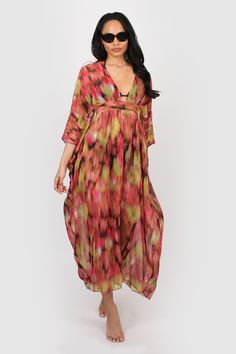 A great kaftan for on holiday over swimwear but looks just as good worn over leggings/shorts and a vest top for garden parties and days in the park. It has a v neck with a cut out on the front and a band that threads through and ties around the body the inside for a flattering shape. Made from a floaty chiffon fabric that falls beautifully around the body. FABRIC: * Man made * Deadstock fabric * Low crease * Light weight SIZING: * One size will fit between 8-16 UK * Model is 5ft 9in and wears th V-neck Beachwear Cover-up For Day Out, V-neck Beachwear Kaftan For Poolside, Flowy V-neck Kaftan For Day Out, Multicolor V-neck Beach Dress For Day Out, Beach V-neck Printed Kaftan, V-neck Kaftan For Poolside And Beach Season, Chic V-neck Beach Dress For Holiday, Casual Multicolor V-neck Cover-up, Spring V-neck Kaftan For Beachwear